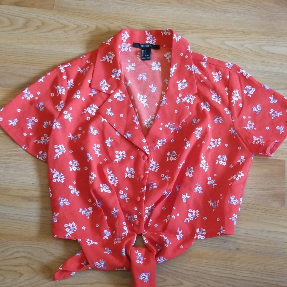 A beautiful red collared, button down crop top